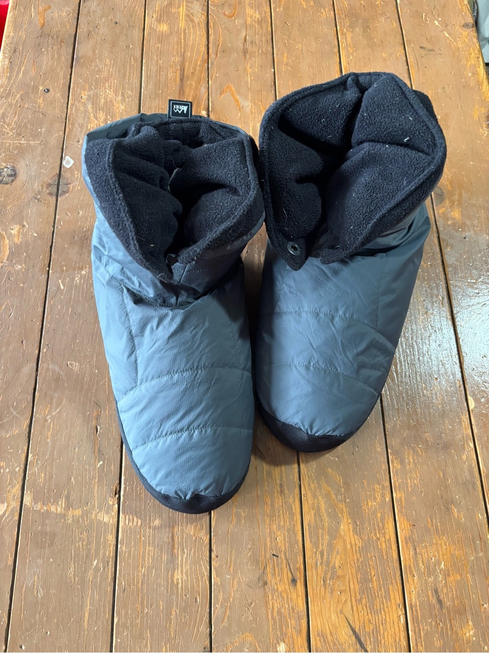 REI Co-op Cabiniste Down Booties lightweight, packable, duck down camp slippers.